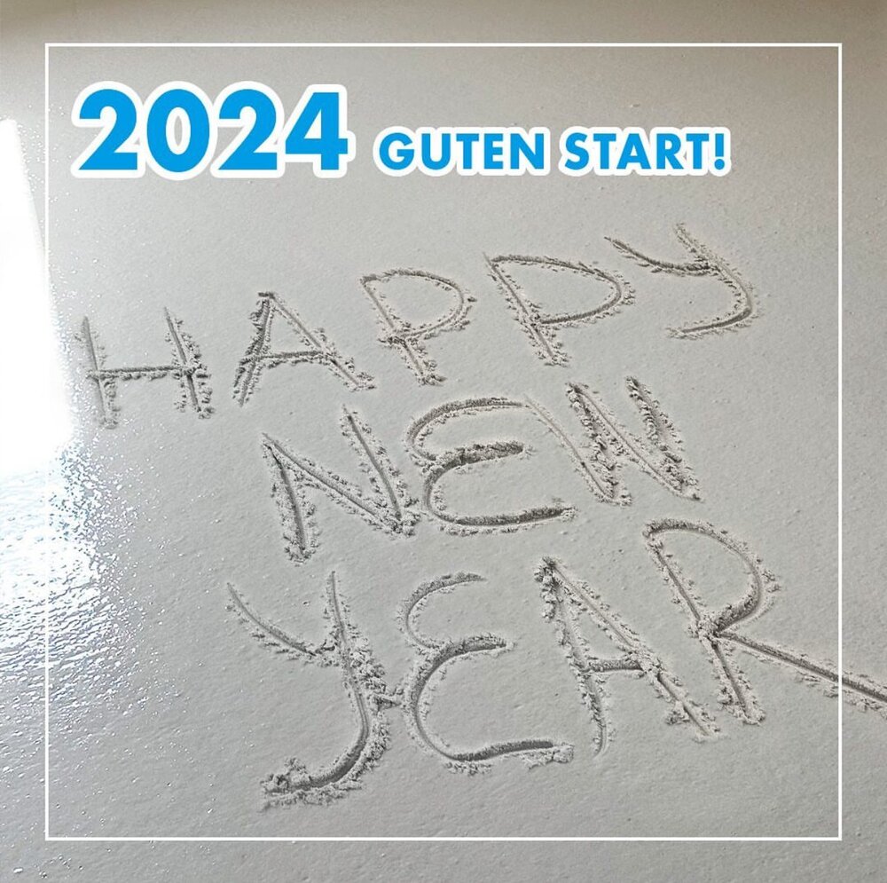 Text im Sand